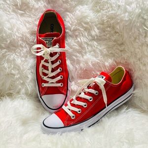 Size 9 women’s or size 7 men’s Red Converse sneakers.